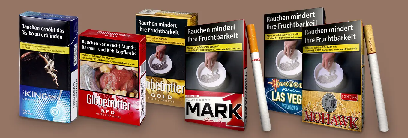 Verschiedene guenstige Zigaretten Beispiele in der Verpackung und mit Zigaretten daneben